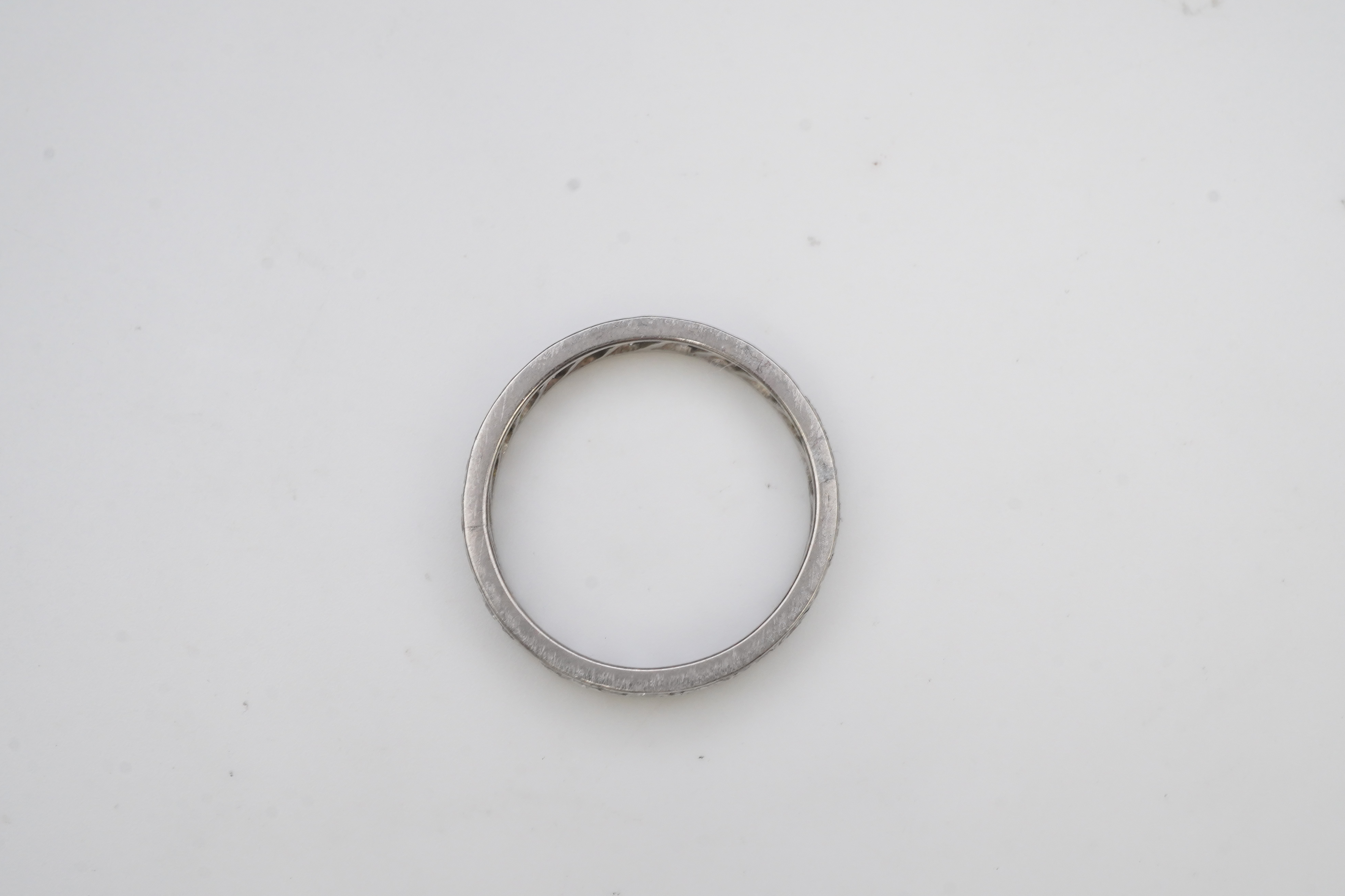 A diamond eternity ring, mid 20th century